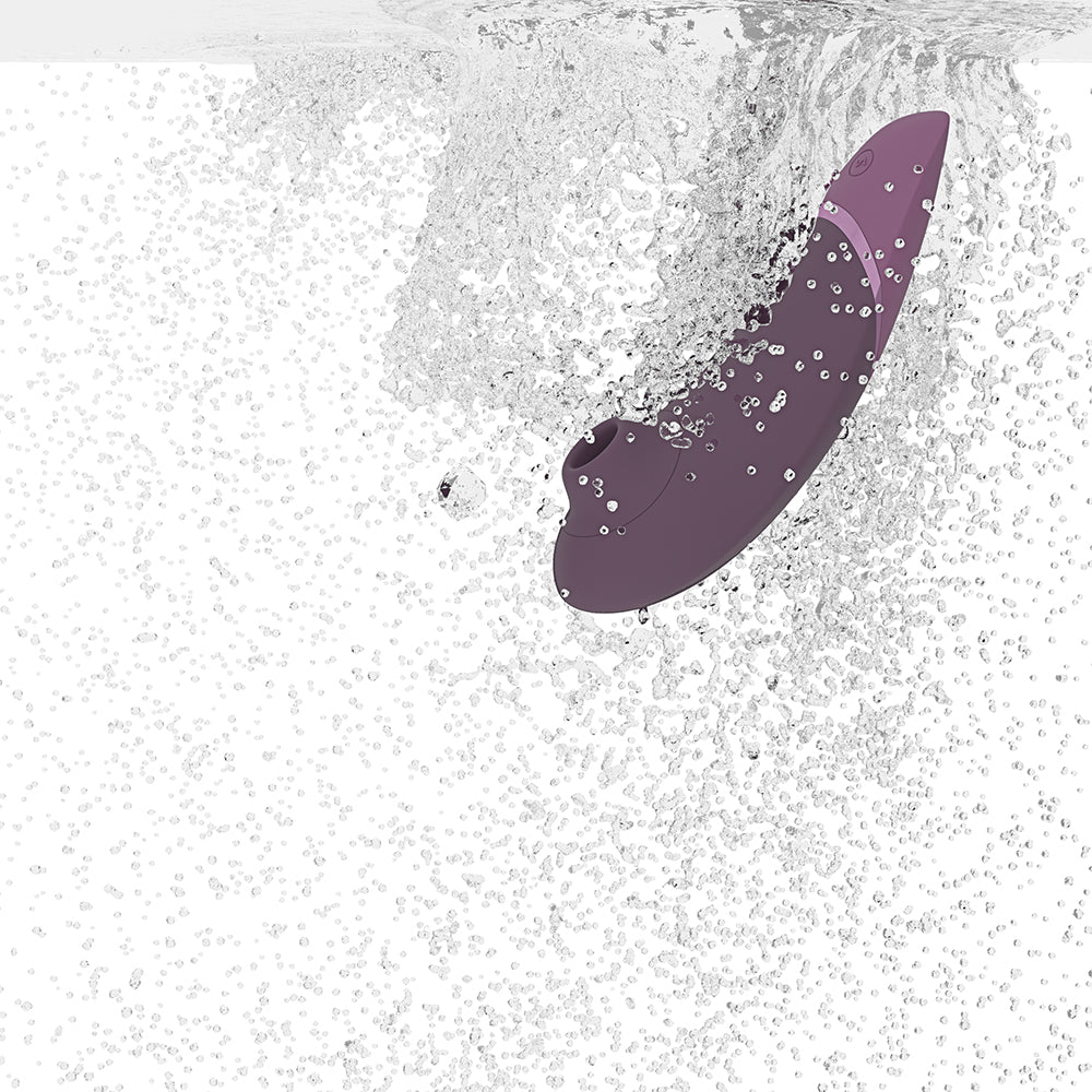 Womanizer Next  Pleasure Air Clitoral Vibrator - Plum